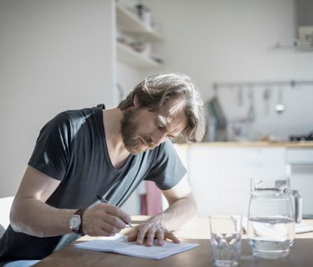 Man filling out form