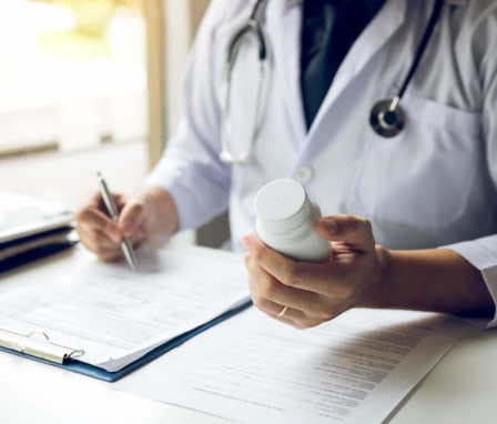Doctor working on a prescription