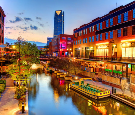 Evening view of the Bricktown Canal in Oklahoma City. Bricktown is an entertainment district just east of downtown Oklahoma City.