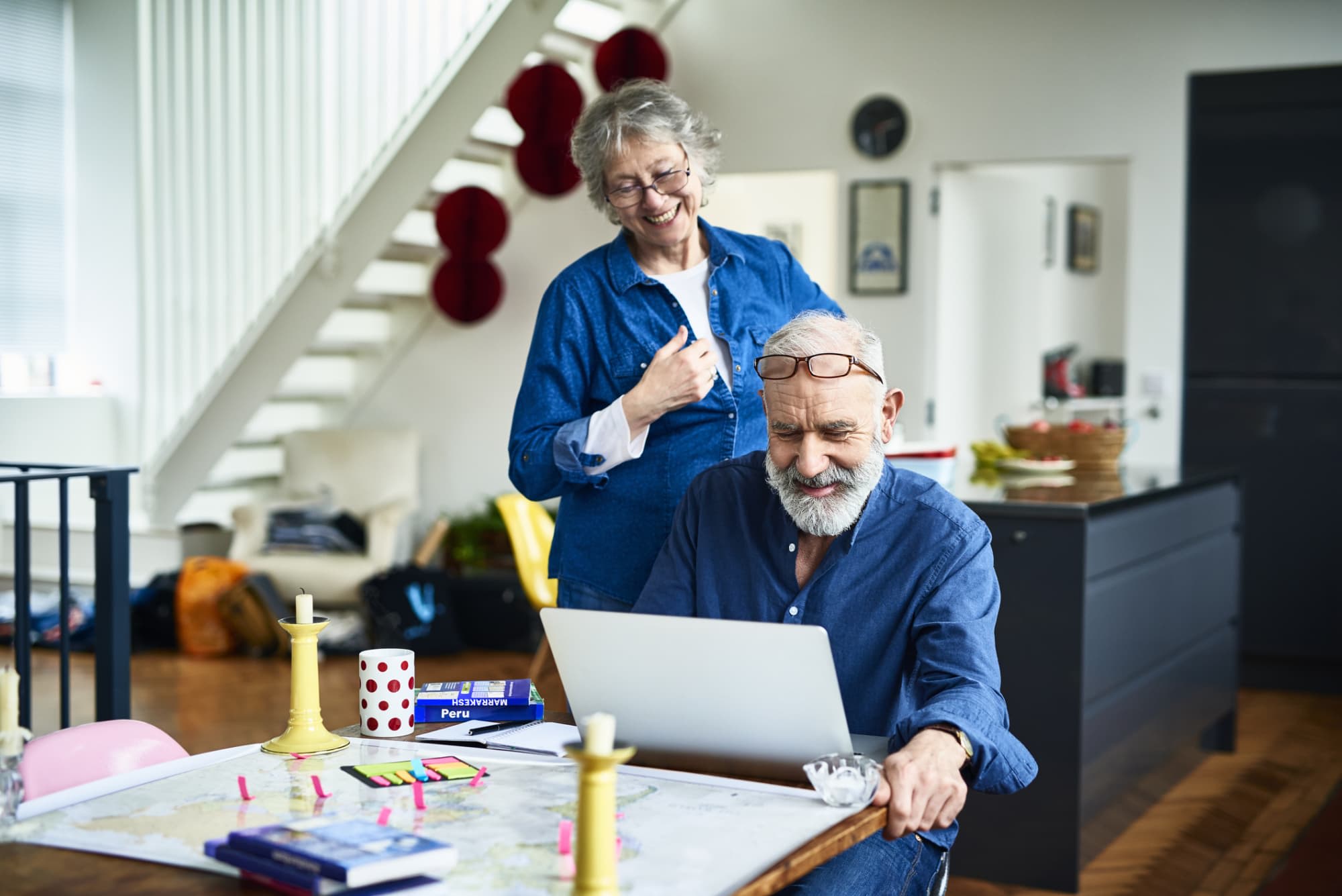 Senior couple on a laptop together at home