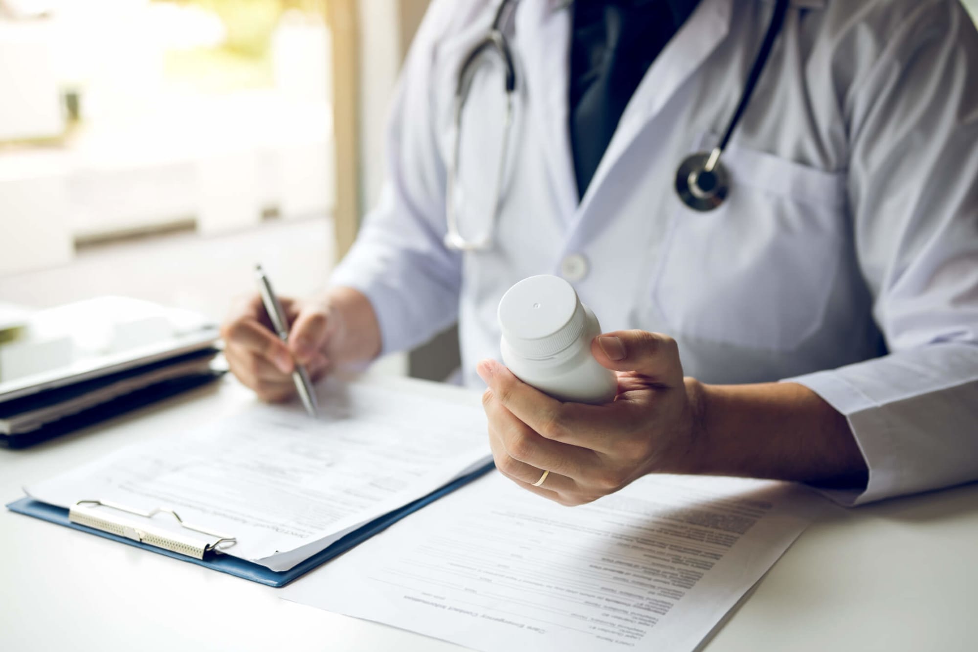 Doctor working on a prescription