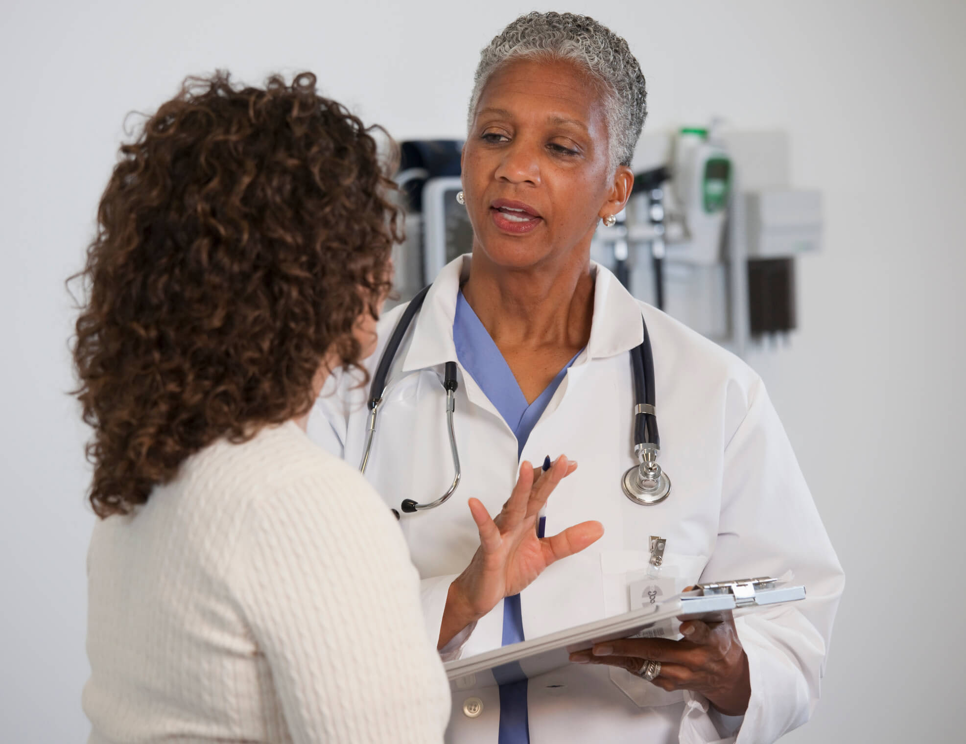 Nurse giving instructions to patient