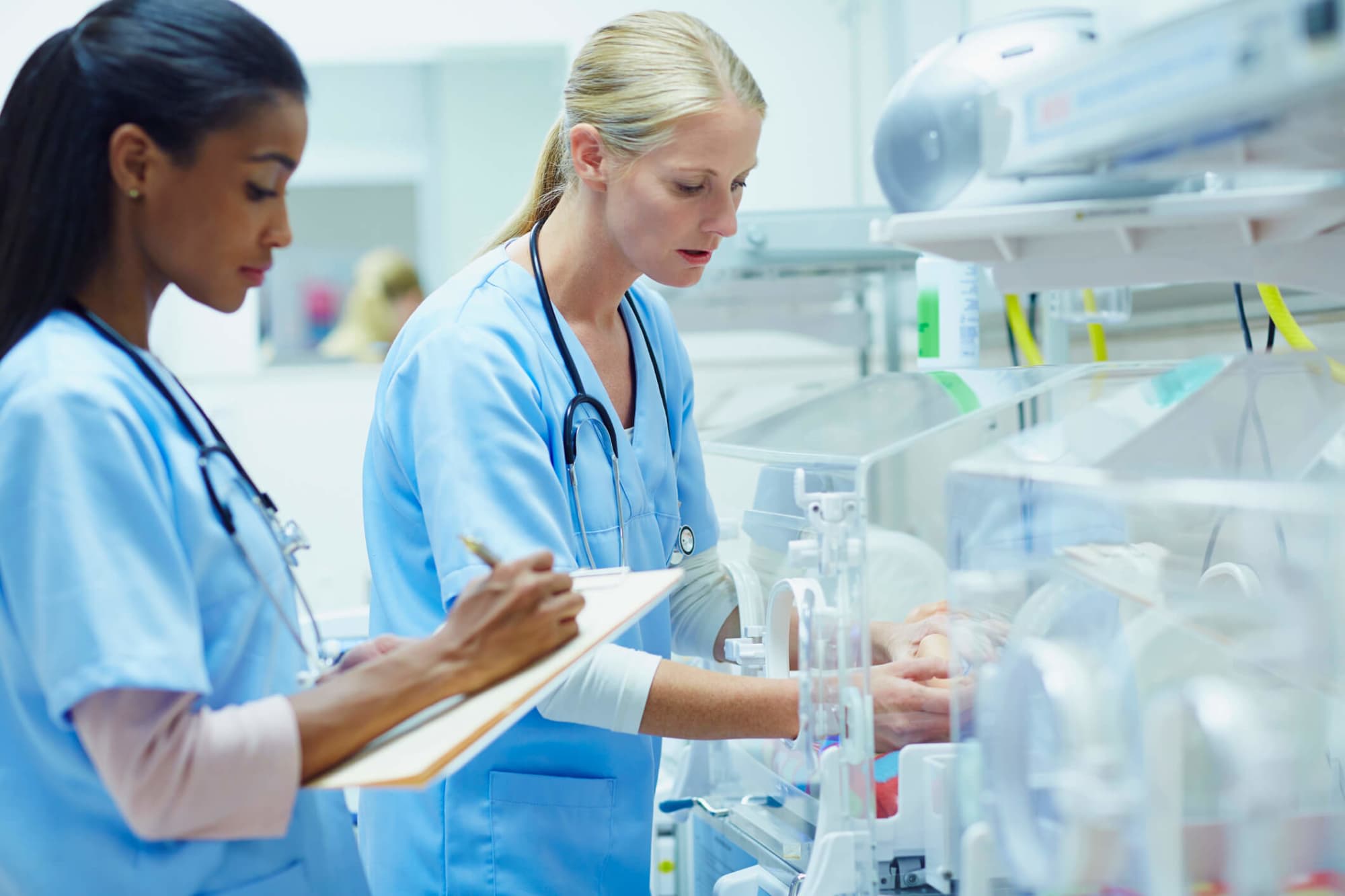 Nurses documenting findings