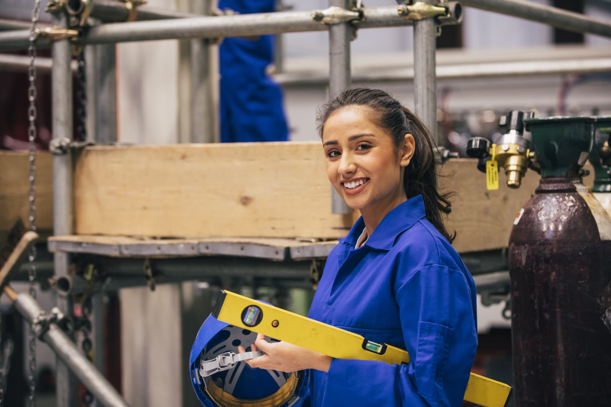 Woman engineering student in workshop