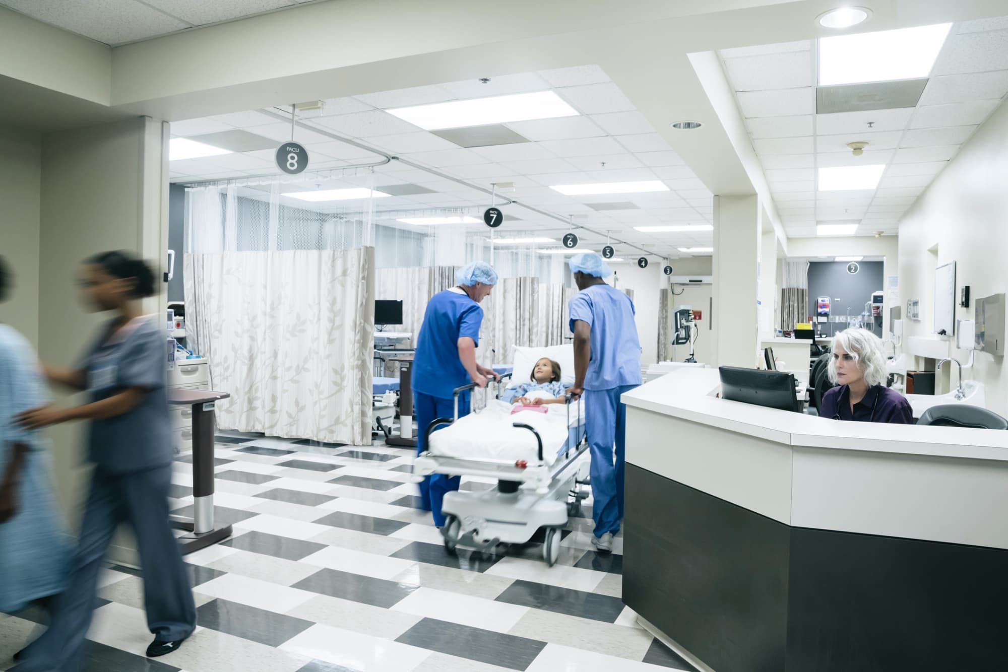 Nurses in emergency room with patients