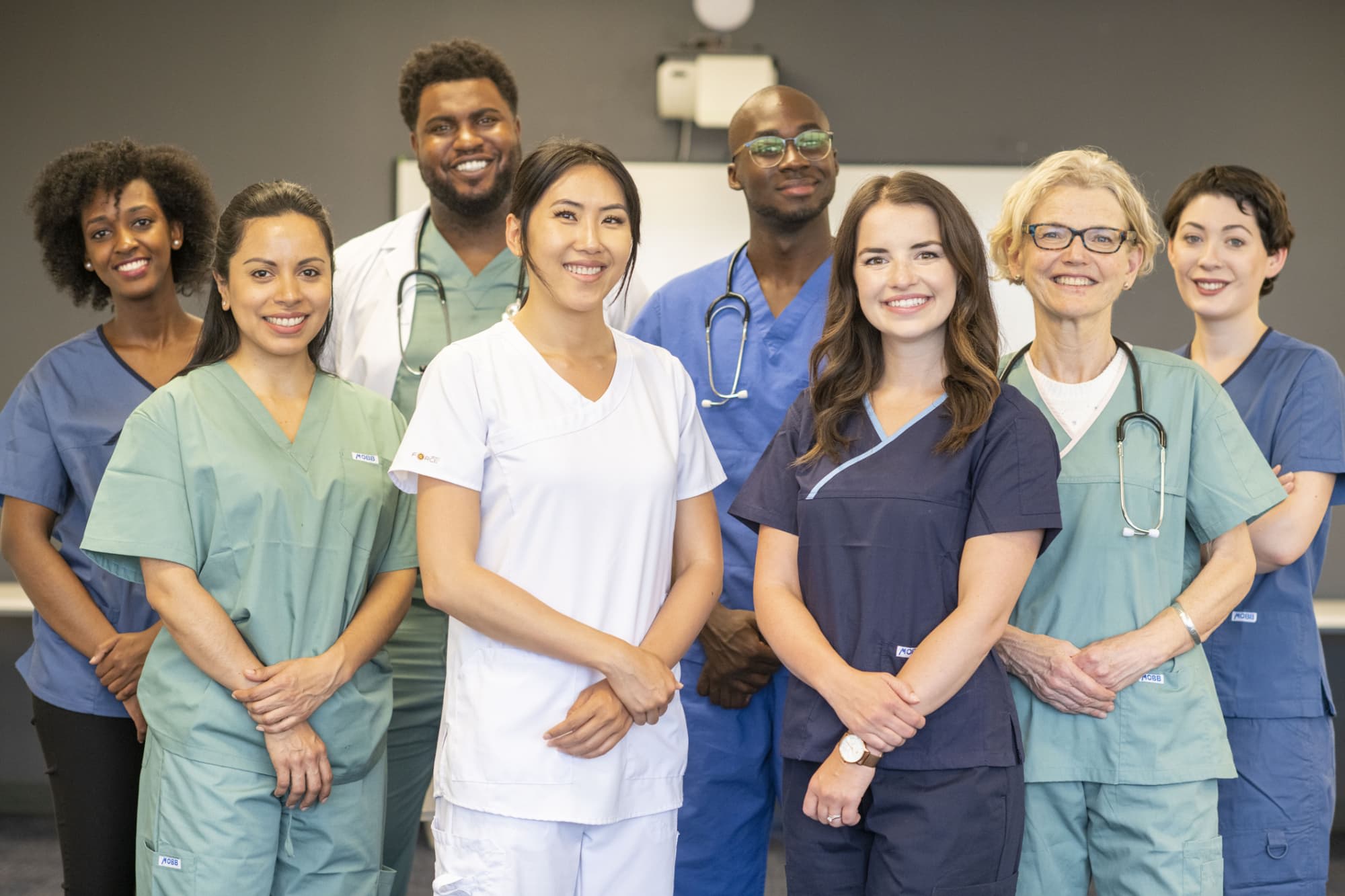 Group of nurse practitioners smiling together