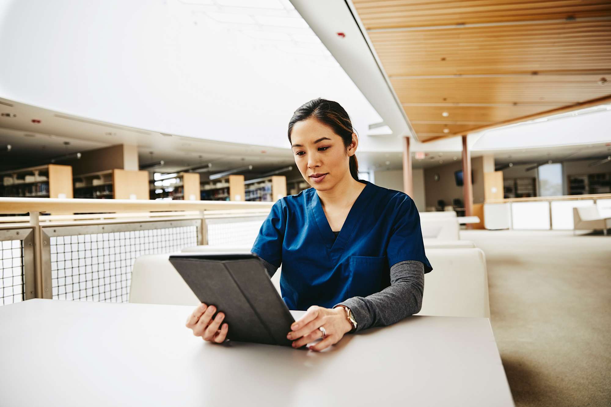 Medical student in library