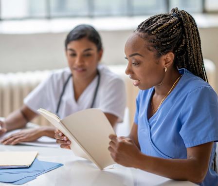 Two nursing students studying together