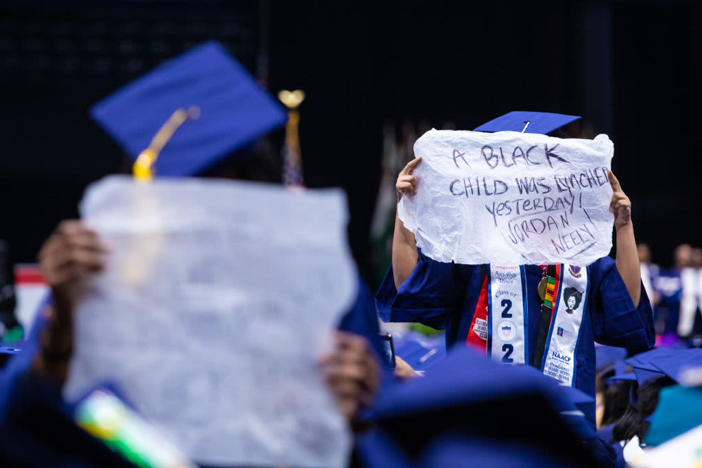 Students protest as US President Joe Biden addresses the graduating class of Howard University during the 2023 Commencement Ceremony at Capitol One Arena on May 13, 2023 in Washington, DC.