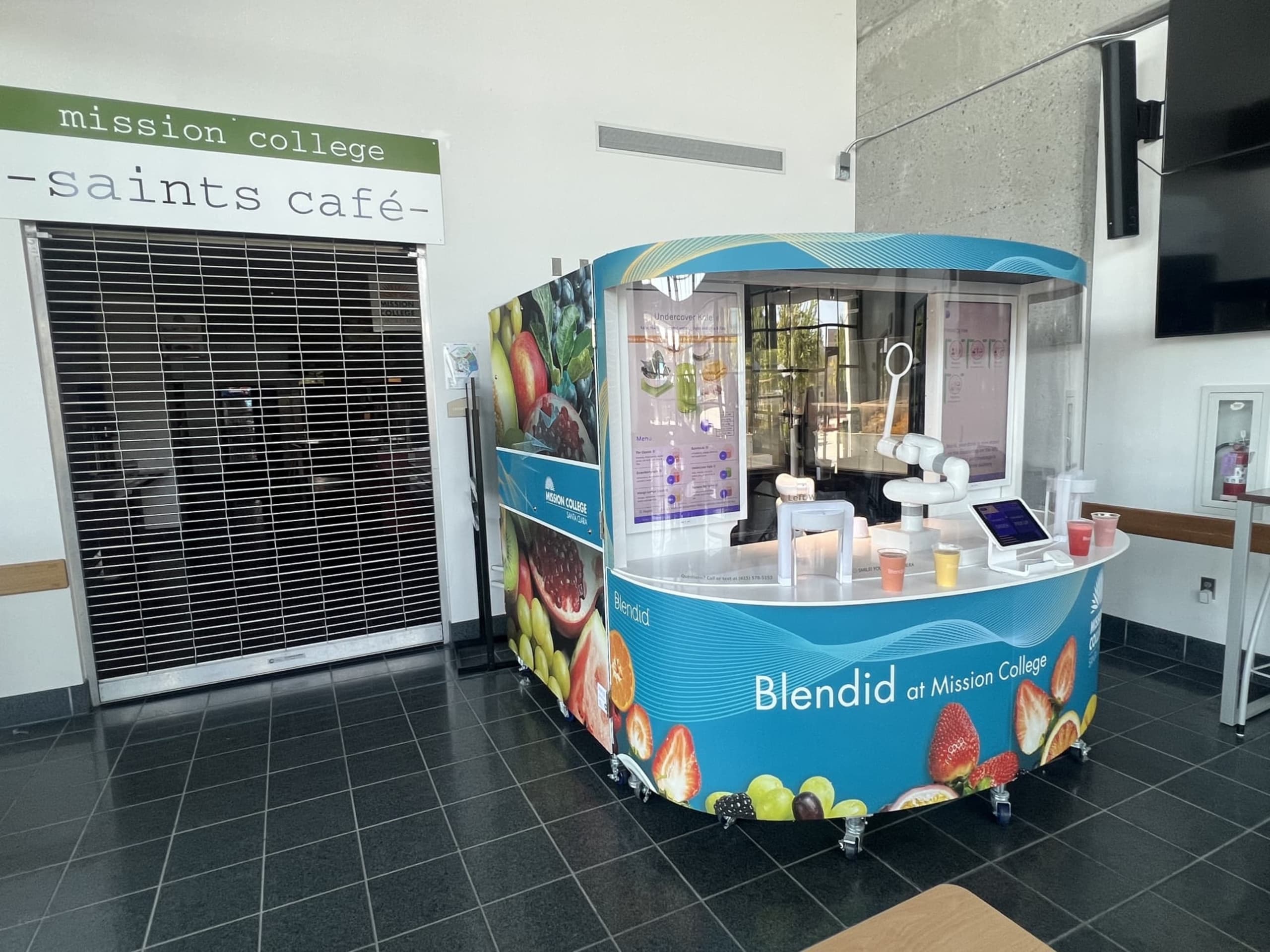 Blendid stand beside Mission College Saint's Cafe