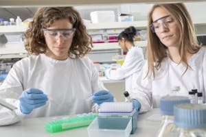 Authentic female researchers in a medical laboratory