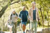 Elderly people hiking in nature