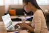 Woman working on her computer
