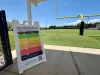 Heat risk guidelines placed outside a turf field at Skyway Sports Complex
