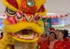 Dragon enters the room for the Lunar New Year celebration at the Brandon Senior Center.