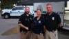 Hillsborough County Code Enforcement's Animal Control Division staff in front of the Command Post trailer.