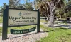 A sign welcomes visitors to Upper Tampa Bay Conservation Park