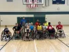 Members of the inaugural Hillsborough County Junior Strong Dogs wheelchair basketball team gather for practice at All People's Life Center. The program gives young athletes with physical disabilities the opportunity to build confidence, learn teamwork, and compete in adaptive sports.