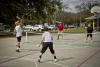 Seniors playing on an outside pickleball court