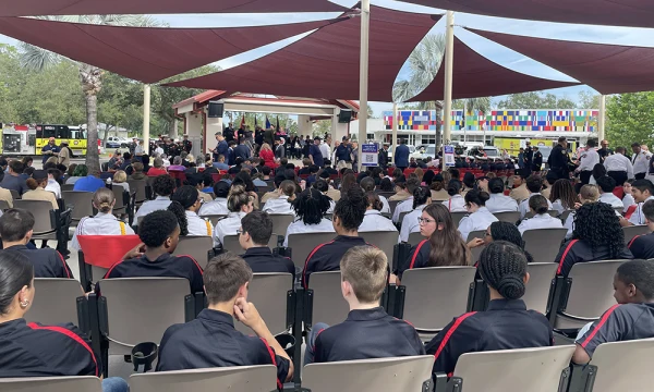 Audience members watch the Patriot Day ceremony