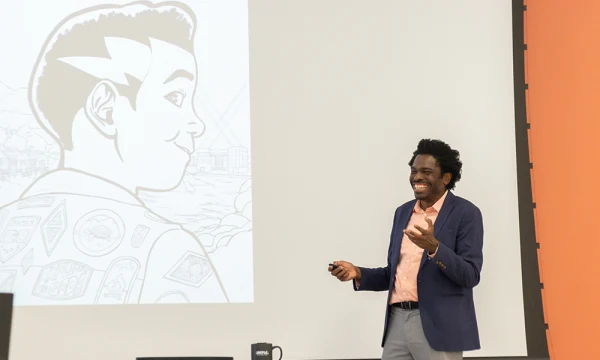 Johnnie Christmas at Hillsborough County Library presenting one of his graphic novel characters