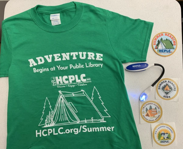 Participants in the reading challenges can earn fun prizes, including t-shirts, booklights, badges, and stickers.