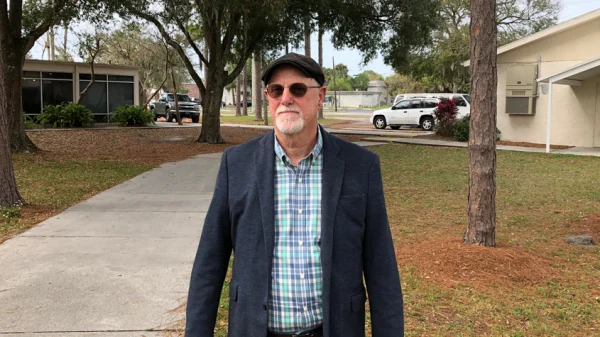 Pastor Don Grantham stands outside of his church
