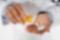 A healthcare professional prescribes medication during dual diagnosis treatment