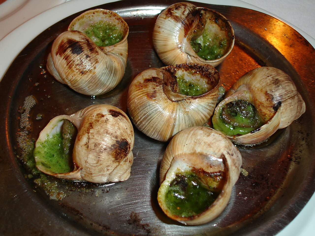 This Weekend Gallery Pairs Well With a Plate of Snails
