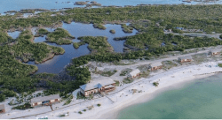 Few houses on a beach. Photo by Architectural Digest from Pinterest.com