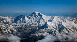 Aerial Photo of mount Everest from an aircraft of the Drulair airline. Photo worked by Papa Lima Whiskey 2 from Wikimedia Commons