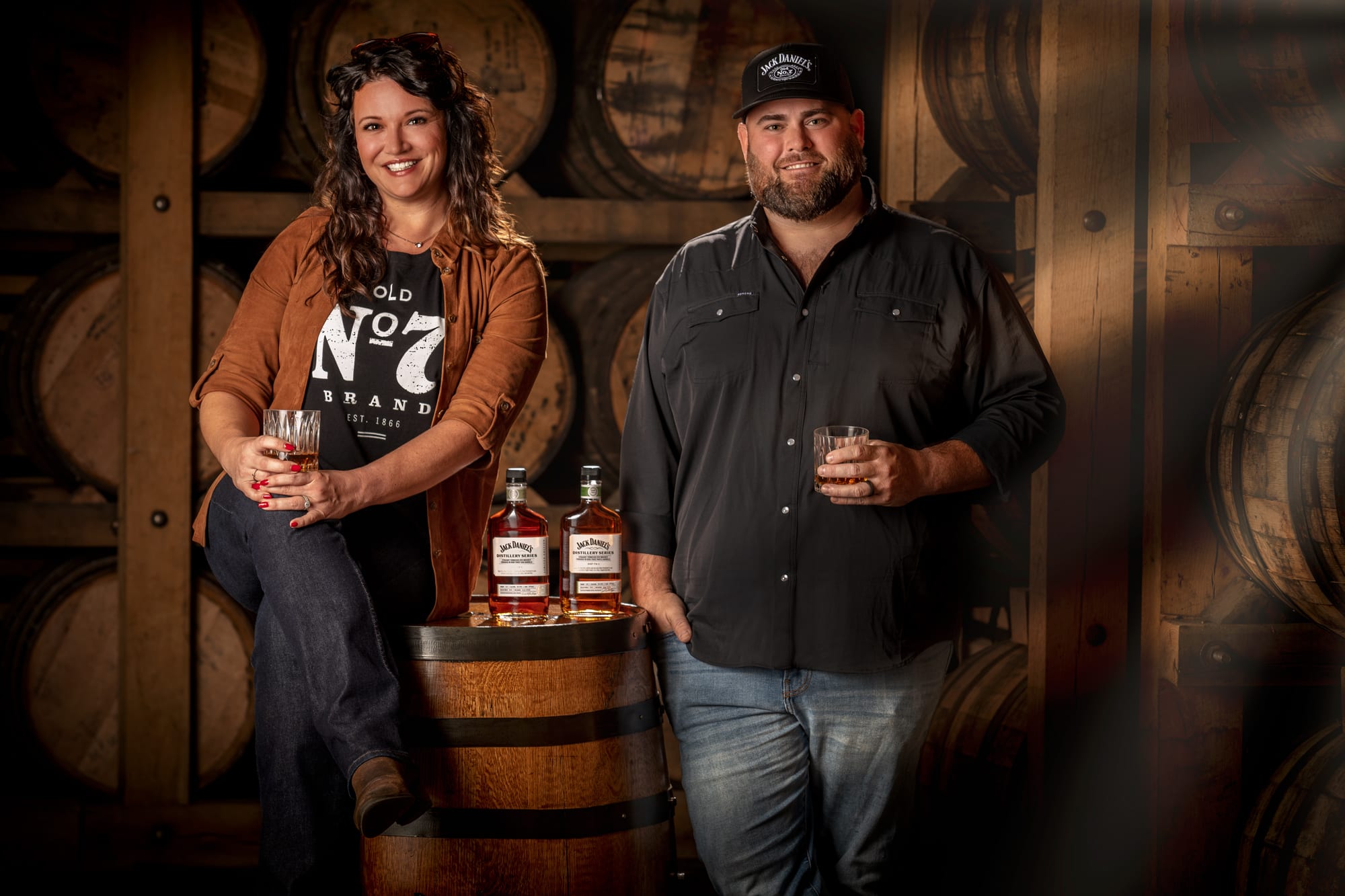 Josh and Lexie in front of the barrels