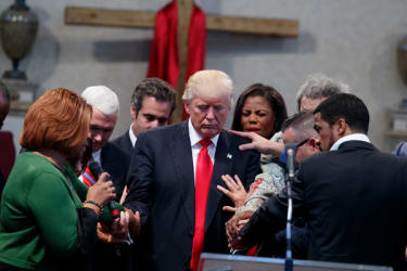 Trump being prayed for image