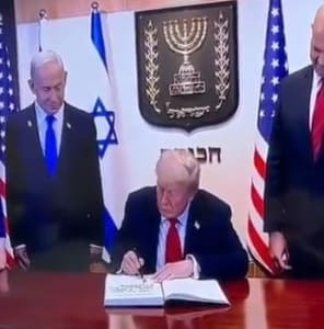 Screen Capture of Trump signing Peace Treaty