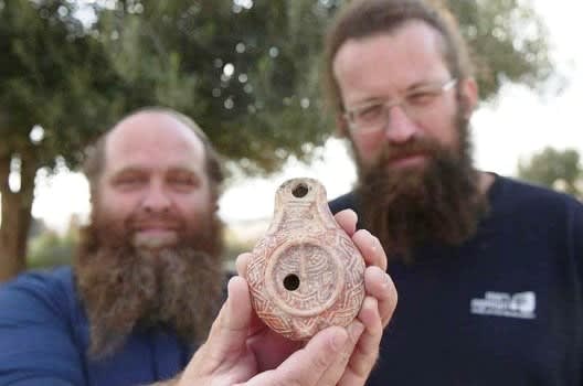 Researchers-Michael-Tchernin-and-Benjamin-Storchen-with-the-rare-candle