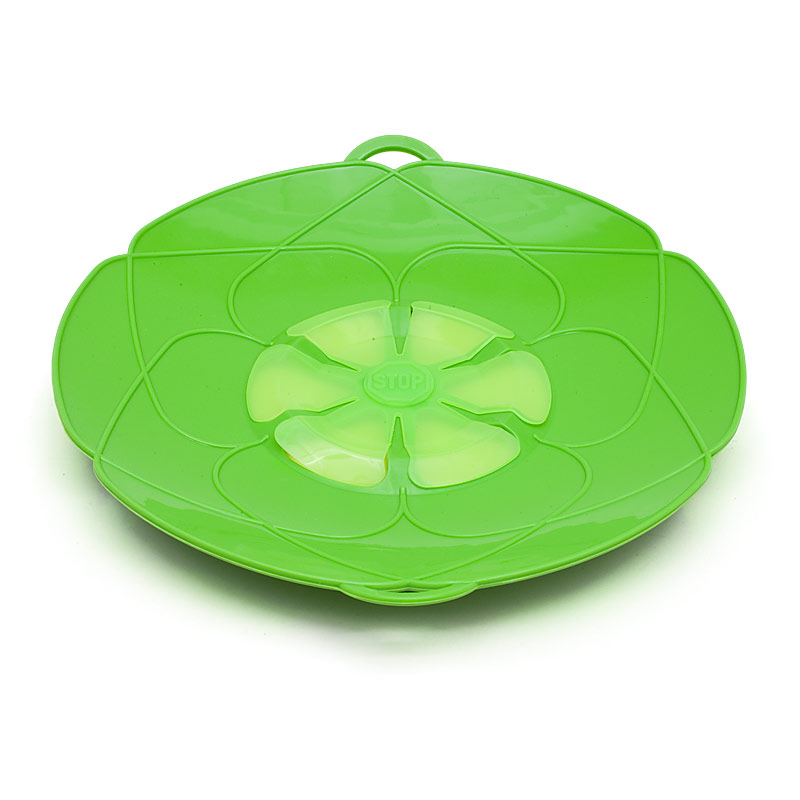 Spill stopper // heat-proof silicone, stops food boiling over