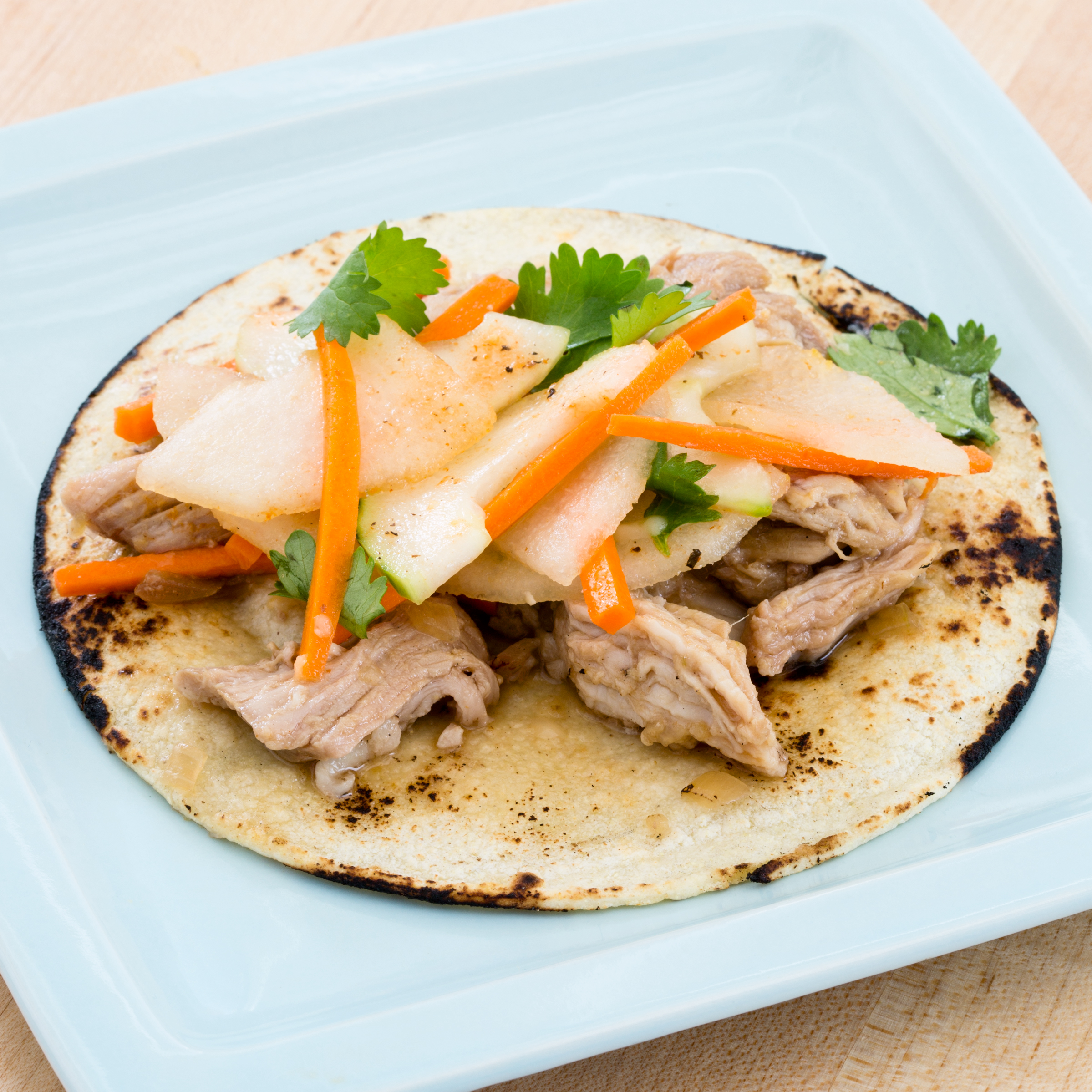 Slow Cooker Pulled Pork Tacos With Pear And Cucumber Slaw America S Test Kitchen