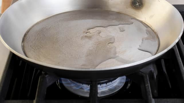 Seasoning Cast Iron and Carbon Steel Pans - The Hotel Leela