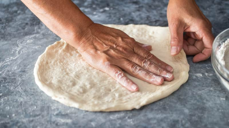 Trouble Stretching Pizza Dough? Use These 6 Tips