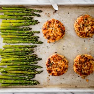 Sheet-Pan Herbed Salmon Cakes with Asparagus and Lemon-Herb Sauce-image