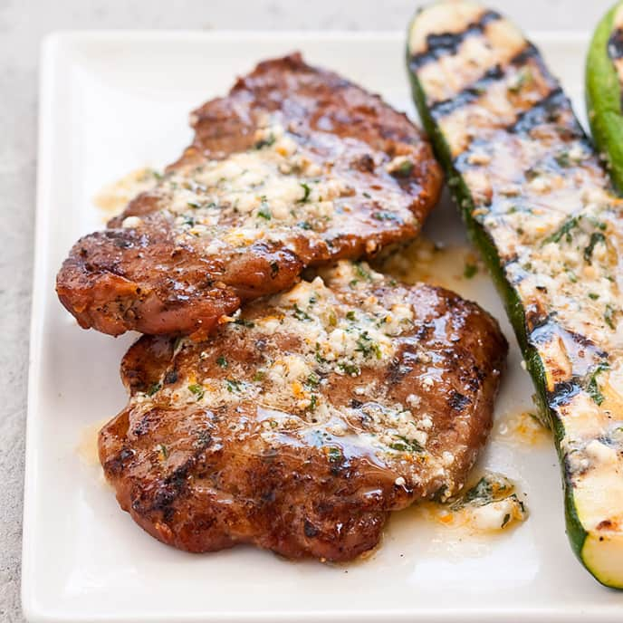 Grilled Pork Cutlets and Zucchini with Feta and Mint Compound Butter