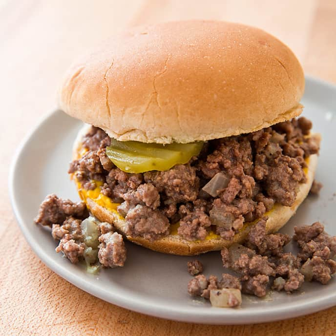 Tender, loose-meat sandwiches, Iowa history, nostalgic flavors.