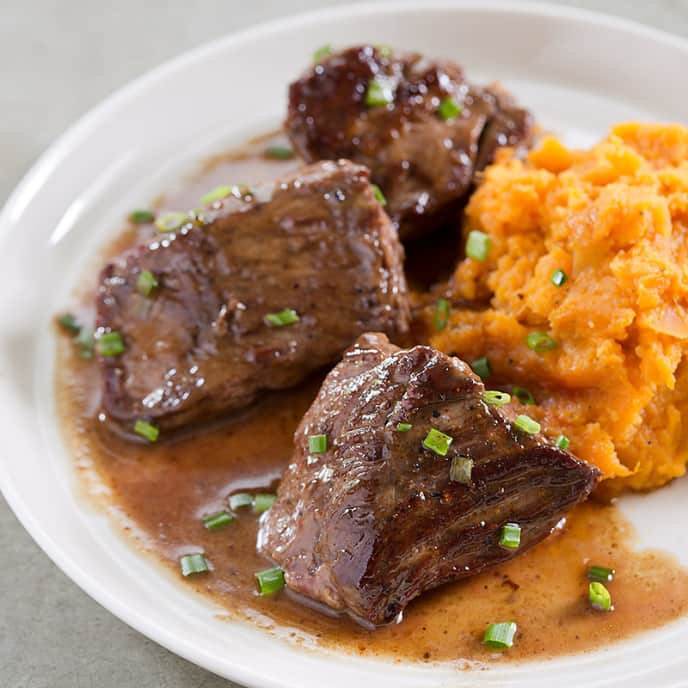 BourbonButter Steak Tips with Maple Mashed Sweet Potatoes America's Test Kitchen Recipe