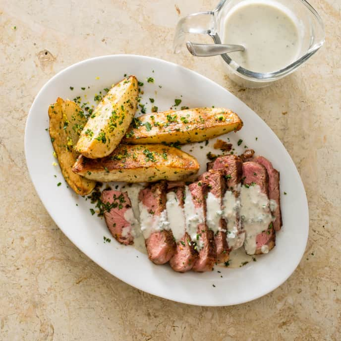 Steak with Lemon-Parsley Potato Wedges and Blue-Cheese Sauce