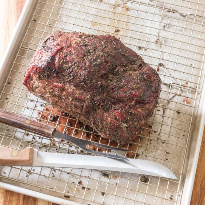 Beef roast top on charcoal grill