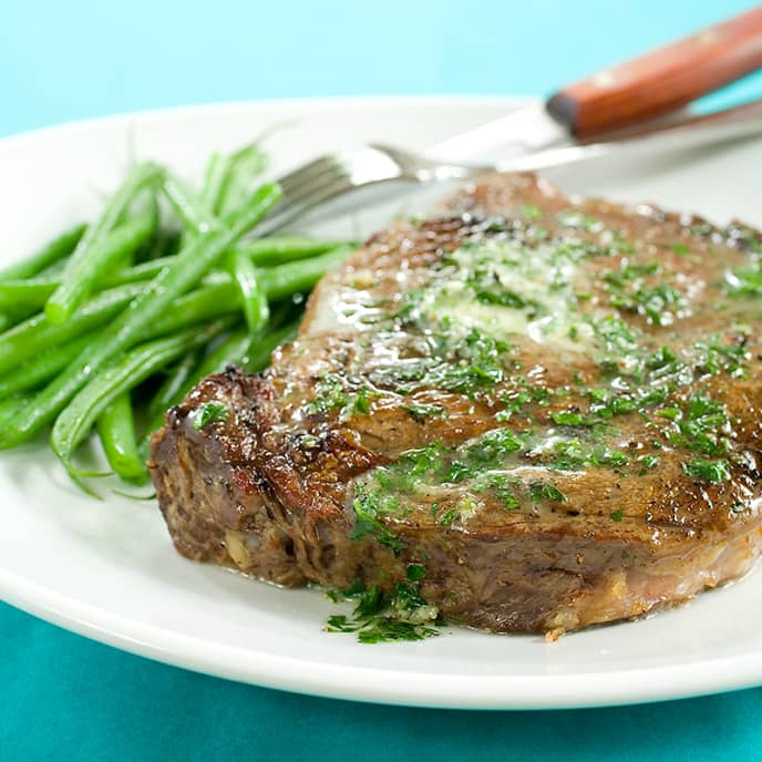 Broiled Rib-Eye Steaks with Fresh Herb Butter