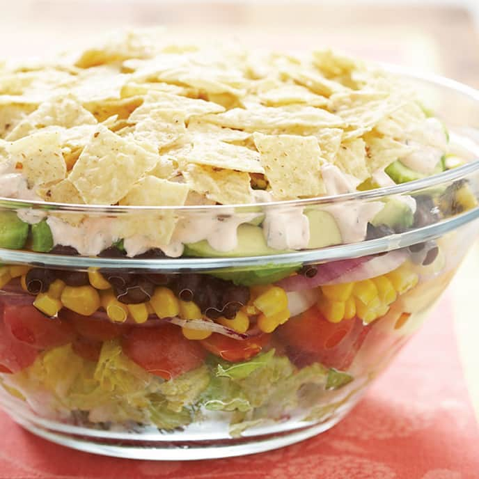 Layered Salad with Tomatoes, Corn, and Avocados