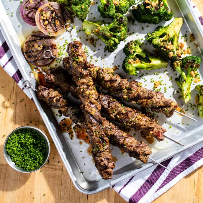 Grilled Steak Tips, Broccoli, and Red Onion with Anchovy-Garlic Butter