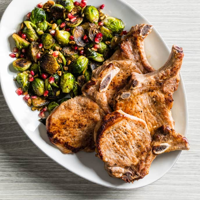 Pan-Seared Pork Chops with Blistered Brussels Sprouts and Pomegranate