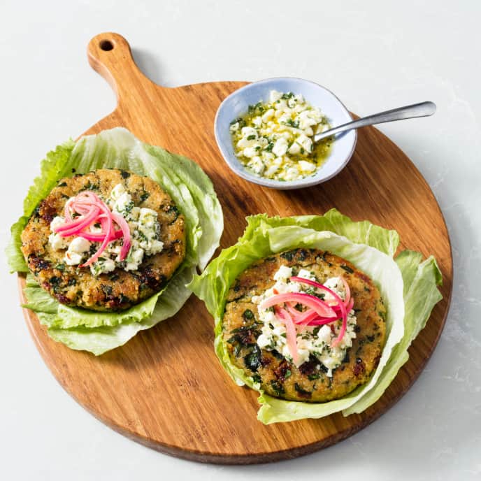 Quinoa Burgers with Spinach, SunDried Tomatoes, and Marinated Feta
